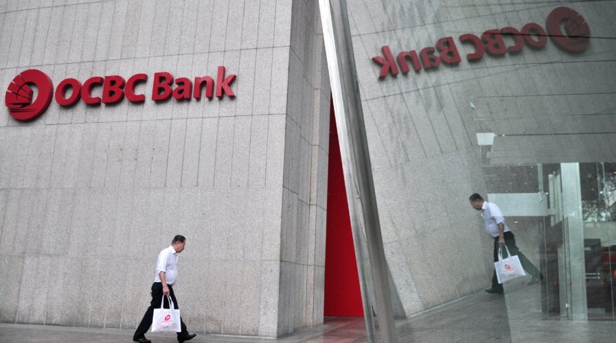 The OCBC bank is one of the first in the world to deploy generative AI tools at scale. (Photo by STEFANUS IAN / AFP)