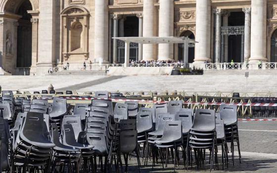 A cluster of stacked chairs is seen in St. Peter's Square at the Vatican March 26, 2025. Pope Francis' general audience, to be held in the square, was suspended due to his ongoing recovery from pulmonary infections. (CNS/Pablo Esparza)