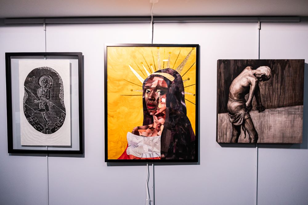 Art hangs on wall.