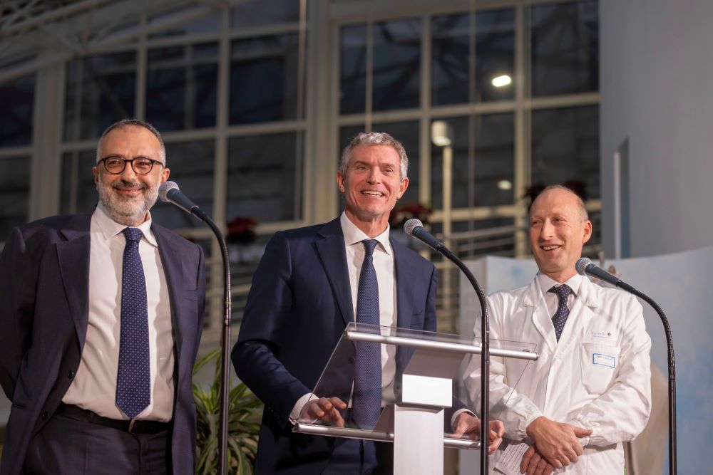 3 men at microphone
