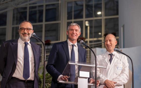 3 men at microphone