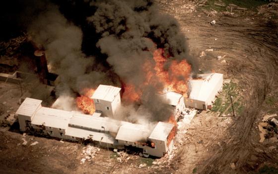 Aerial view of Branch Davidian compound near Waco, Texas, in flames on April 19, 1993, following a 51-day siege by the FBI and law enforcement. (Wikimedia Commons/FBI)