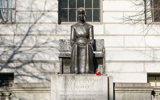 A statue honoring Quaker religious martyr Mary Dyer as a "witness for religious freedom" stands outside the Massachusetts State House in Boston. (Wikimedia Commons/Daderot)